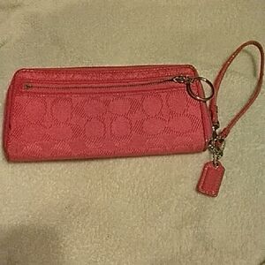 Coach Orange Wristlet with Signature Design